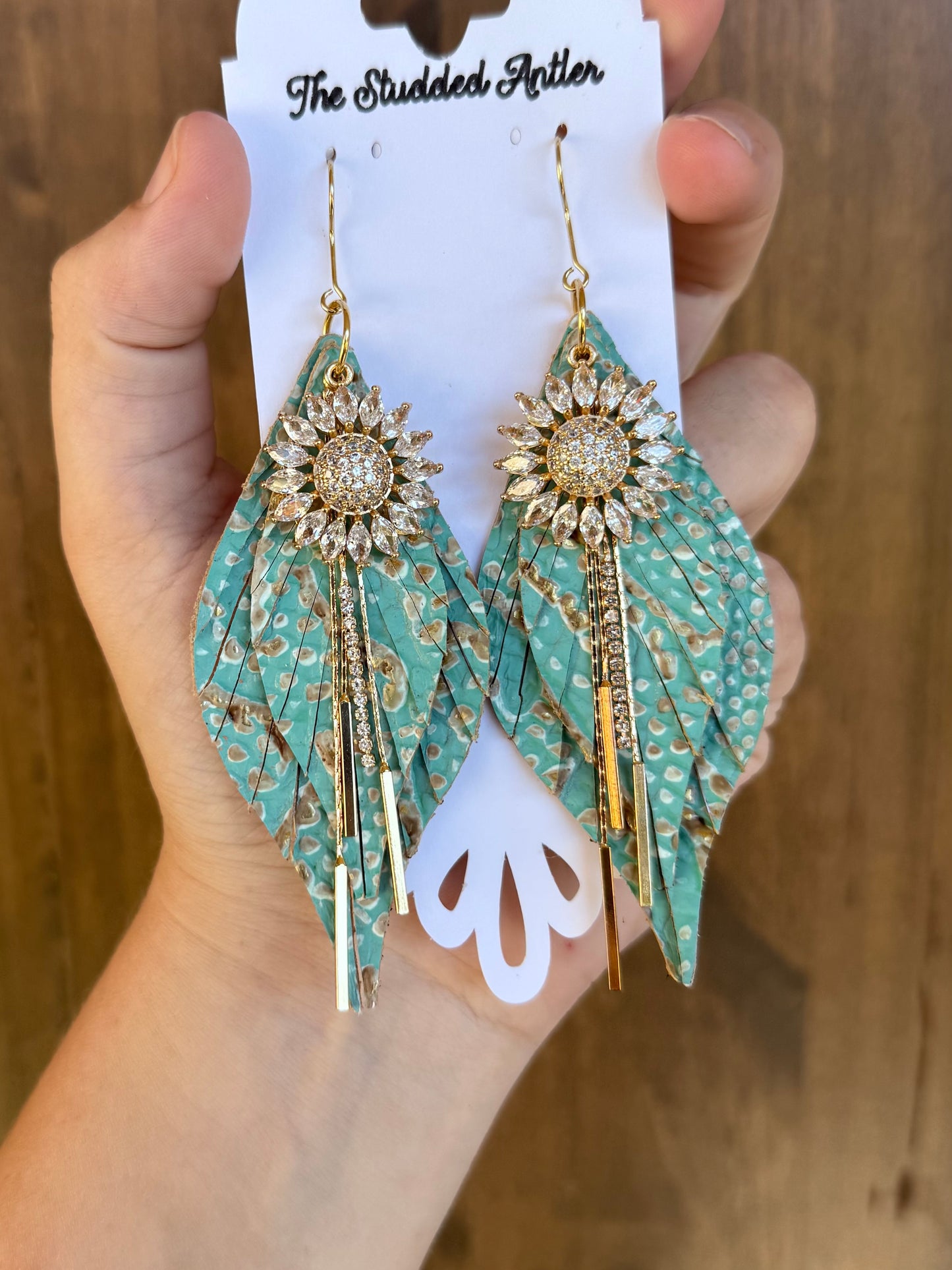 Handmade Hypoallergenic Mint Blue and Gold Embossed Leather Earrings with Gold CZ Sunflower Pendants and Metal Rhinestone Tassels