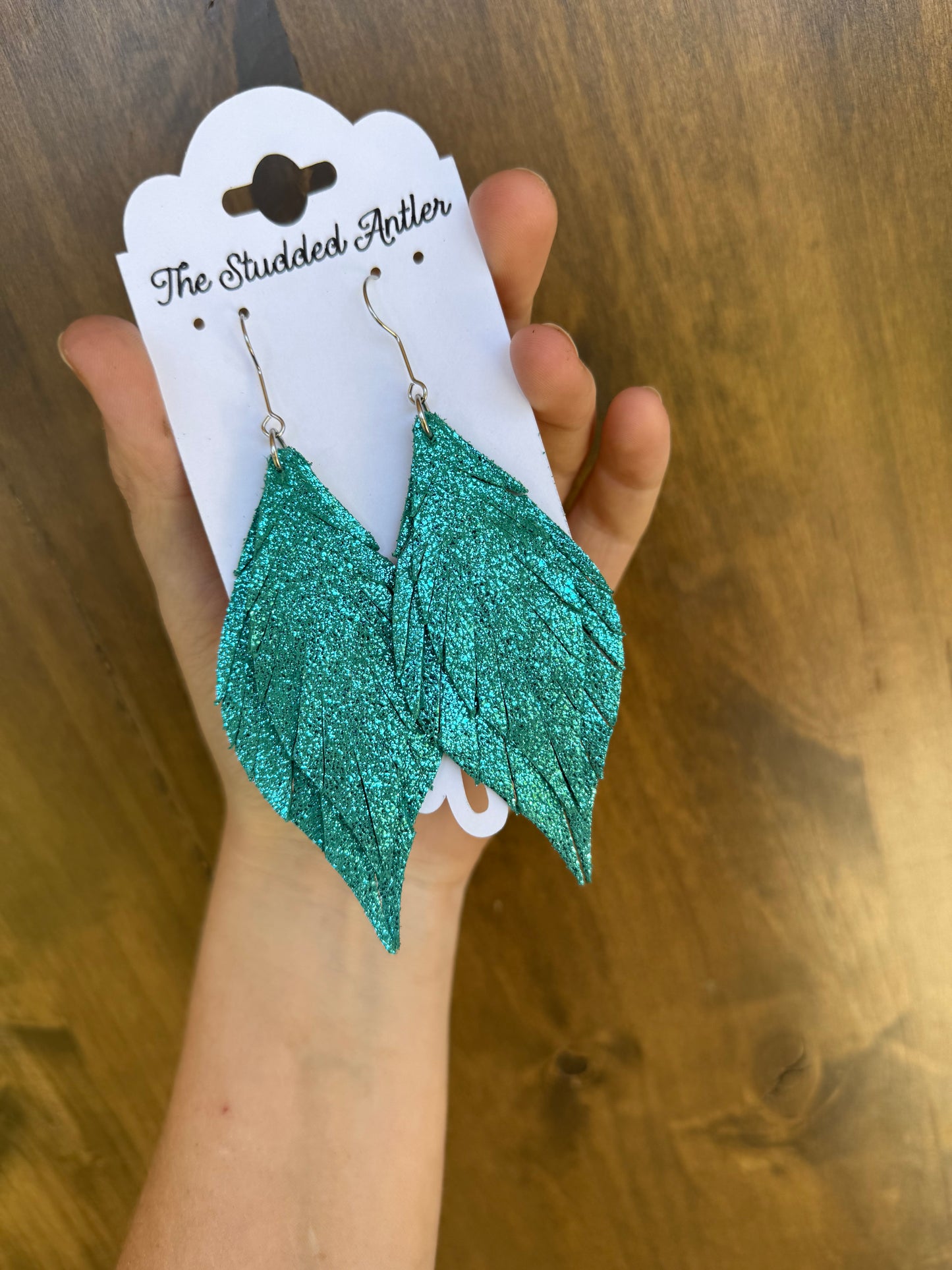 Fringe Feather Leather Earrings
- Women’s NFR Western leather Earrings - Turquoise Blue and Silver Rhinestones