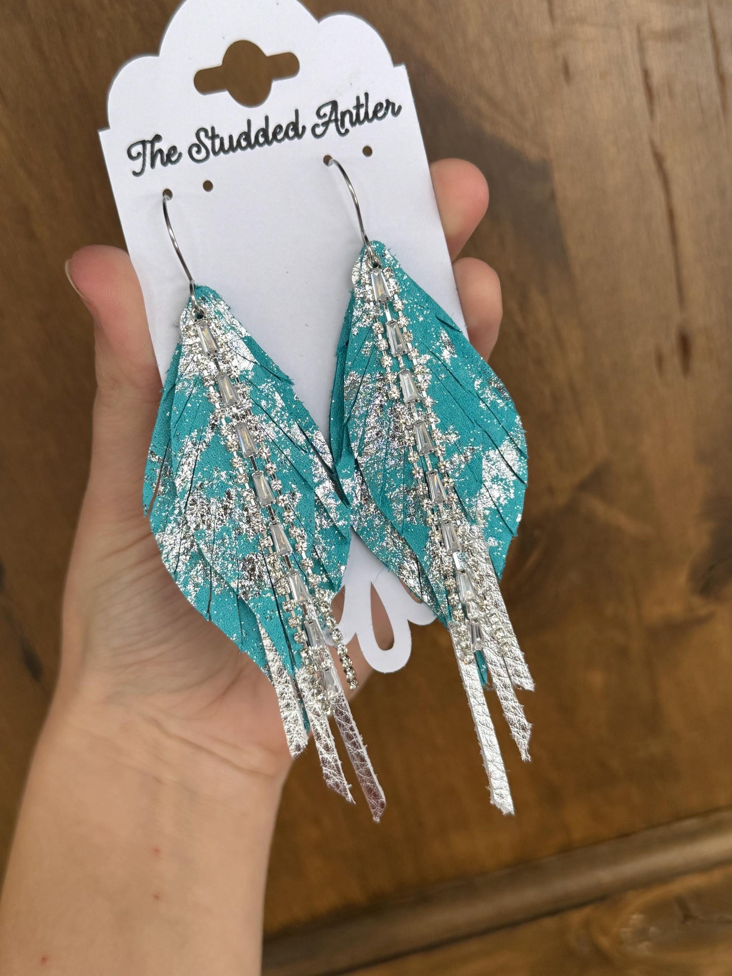 Blue and silver western style leather earrings