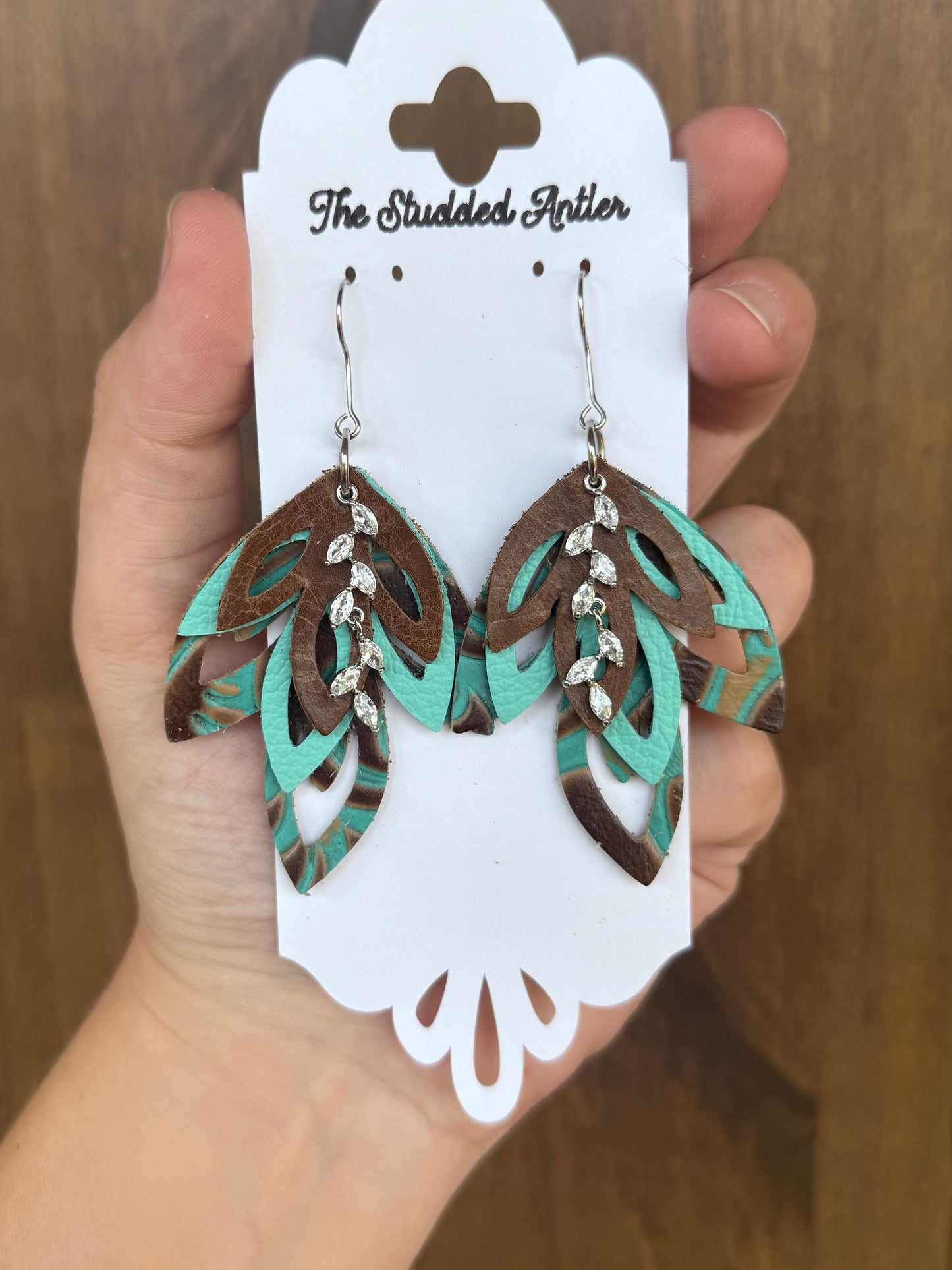 Handmade Hypoallergenic Aqua Blue and Brown Tooled Leather Earrings with Silver CZ Rhinestone Charms