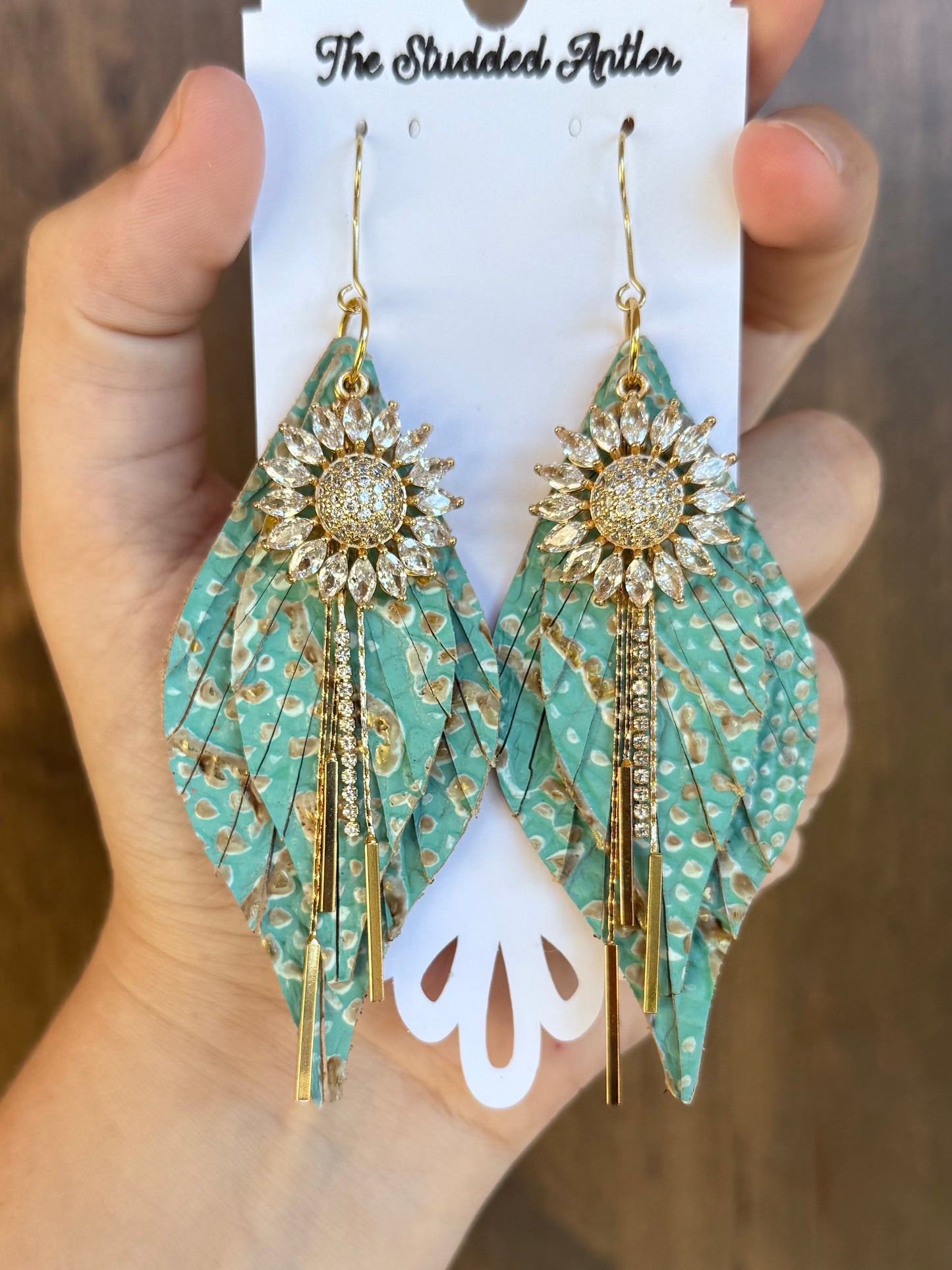 Handmade Hypoallergenic Mint Blue and Gold Embossed Leather Earrings with Gold CZ Sunflower Pendants and Metal Rhinestone Tassels