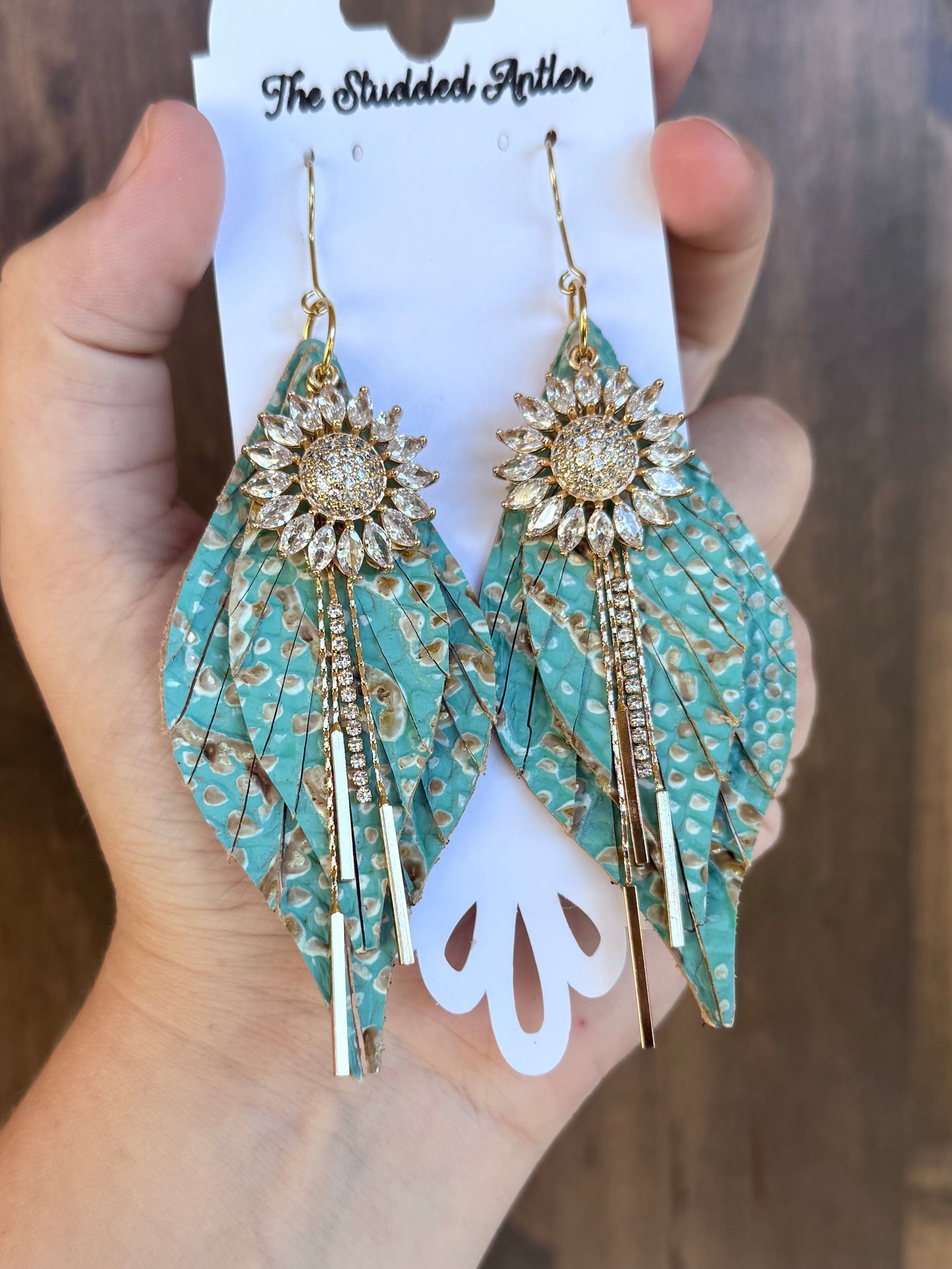 Handmade Hypoallergenic Mint Blue and Gold Embossed Leather Earrings with Gold CZ Sunflower Pendants and Metal Rhinestone Tassels