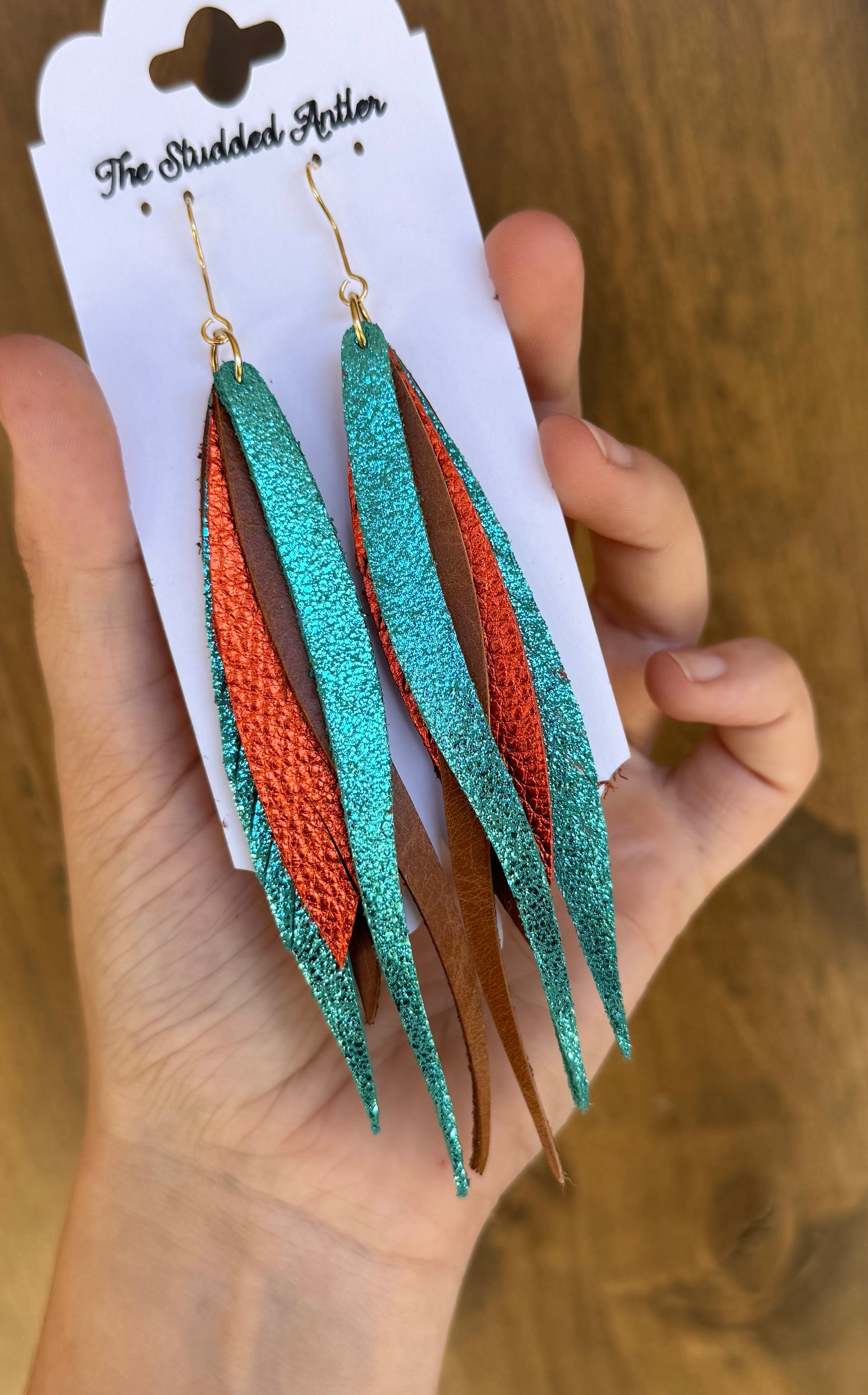 Turquoise-blue-leather-feather-earrings