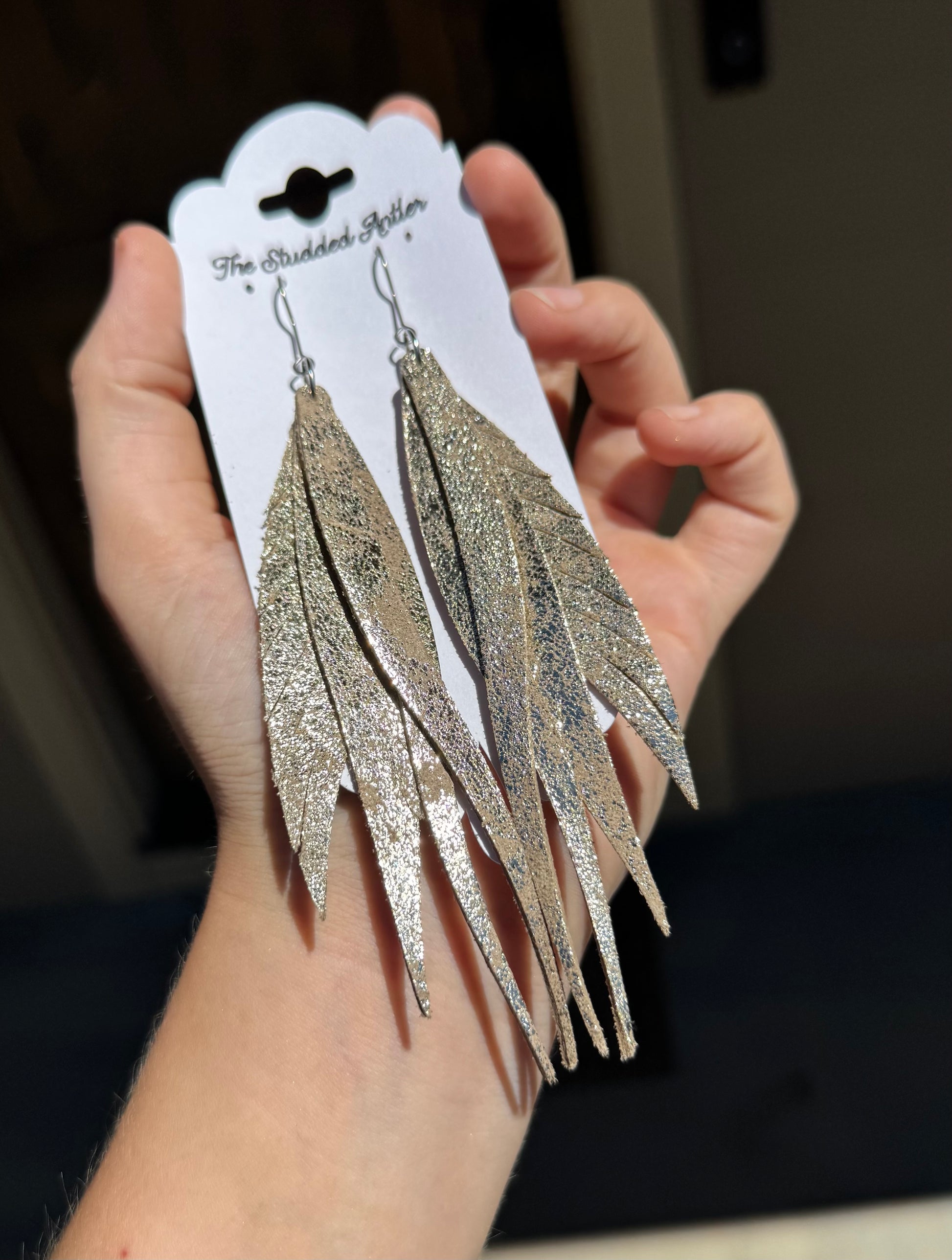 Silver-shimmer-leather-feather-earrings