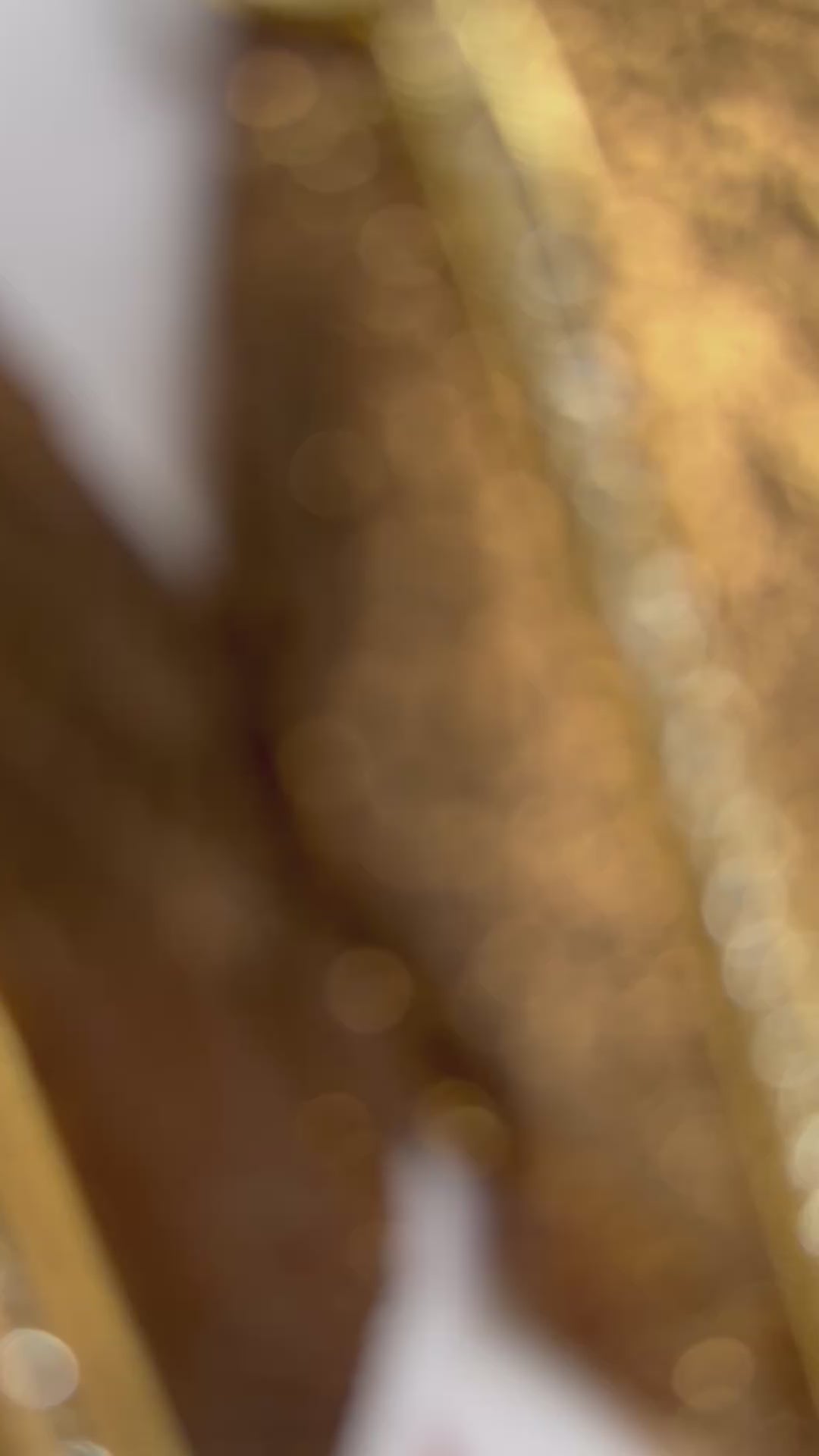 Video of brown shimmer leather earrings with gold rhinestone tassels concert wear 